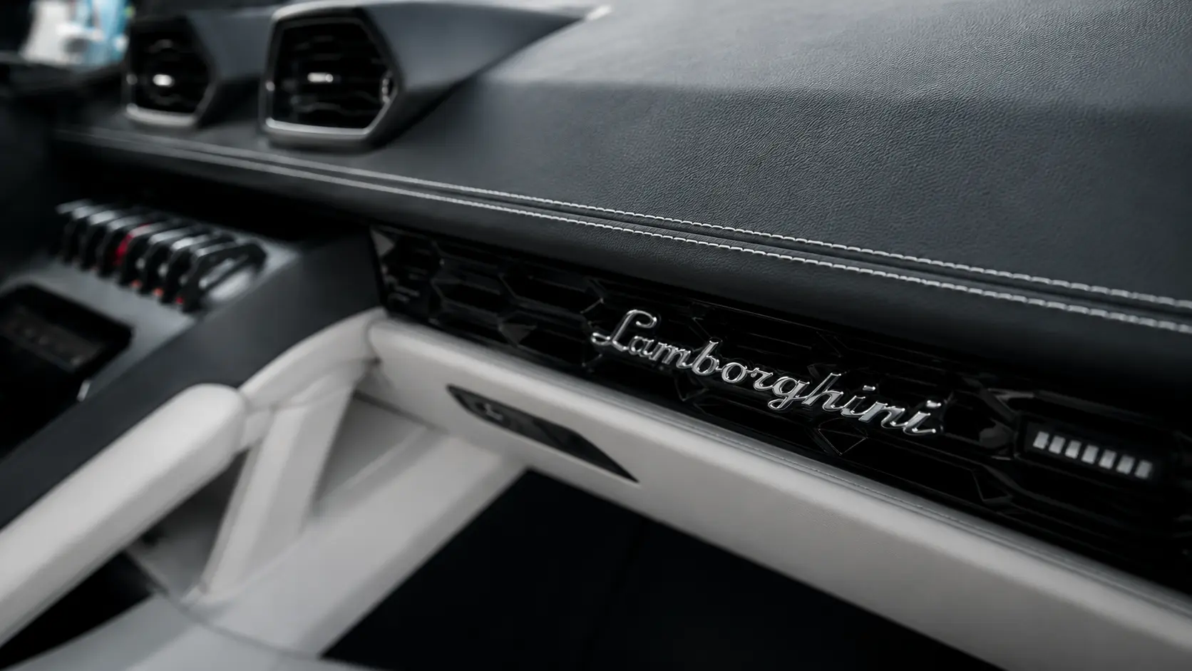 Lamborghini interior detail and brand close-up